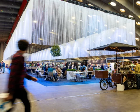 Professionals networking and discussing pool technologies at PoolXpo 2026 trade fair in Brabanthal, Leuven, Belgium