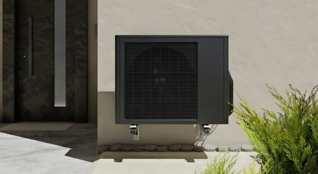 Black pool heat pump mounted on exterior wall