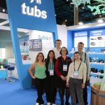 Team of Tubs Parts on their exhibition stand at a pool and spa industry trade show Piscina Barcelona.
