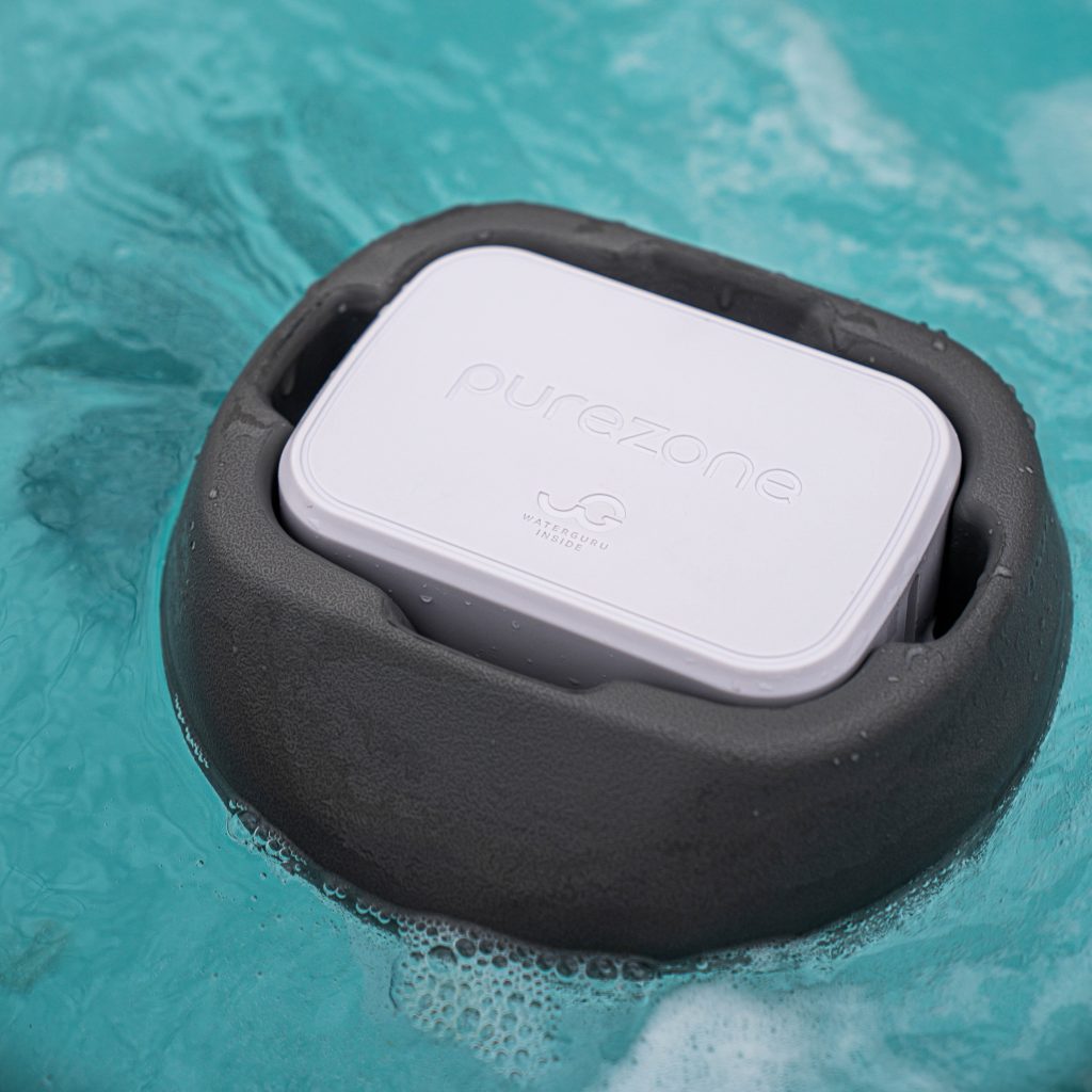 Purezone Hover floating in bubbling spa water for automated testing.