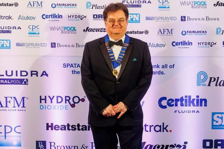 Dorian Davies, BSPF President, at the 2026 British Pool & Hot Tub Awards wearing his presidential chain.