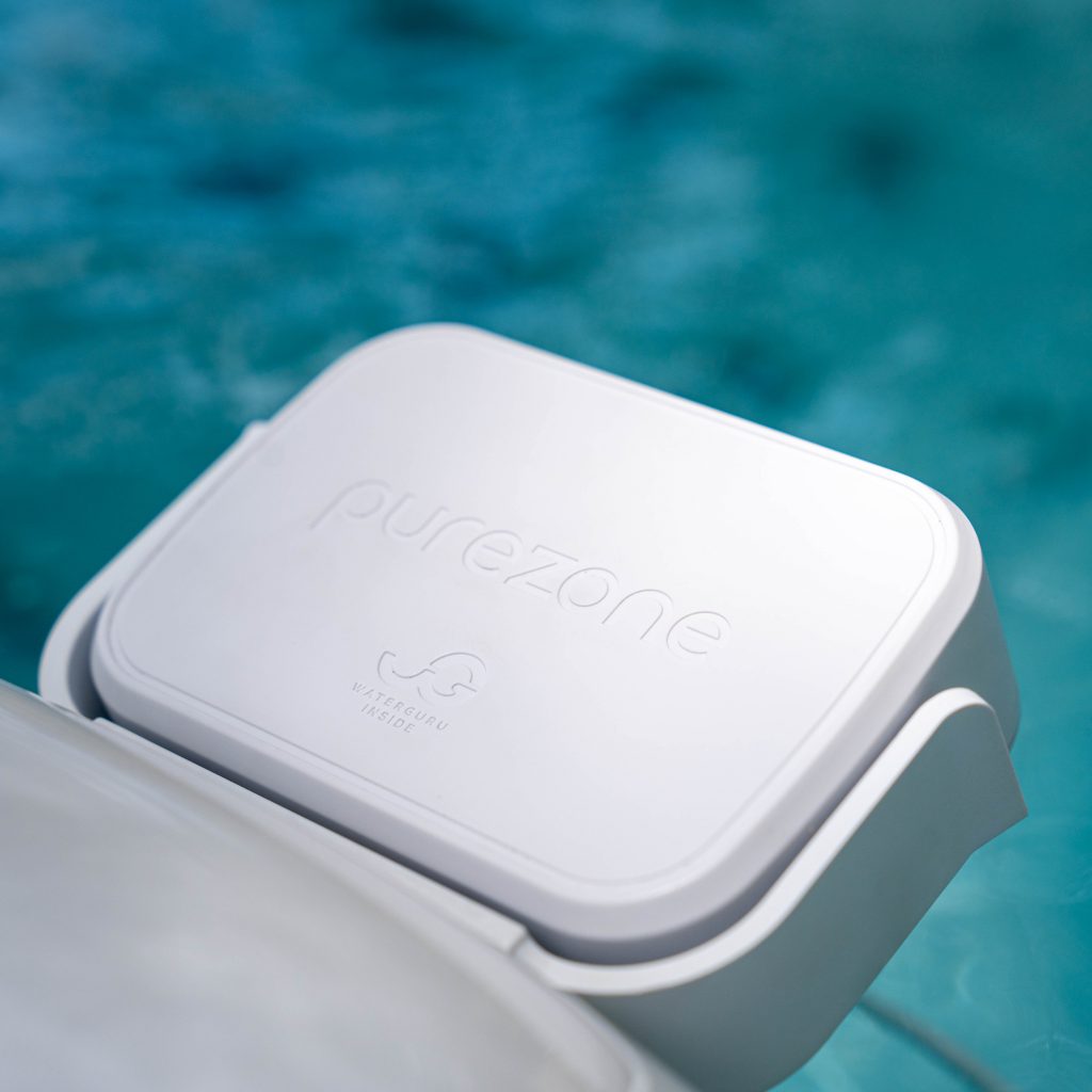 Close-up of Balboa Purezone Dock water management device mounted on a spa wall.