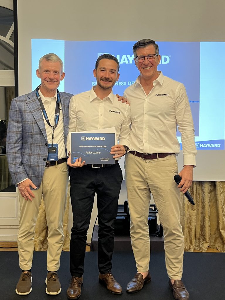 Javier Lozano winning the Best Business Development award at Hayward event