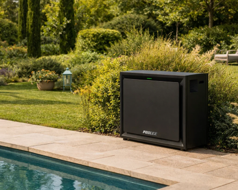 Poolex Airline 360 premium pool heat pump installed next to a luxury swimming pool