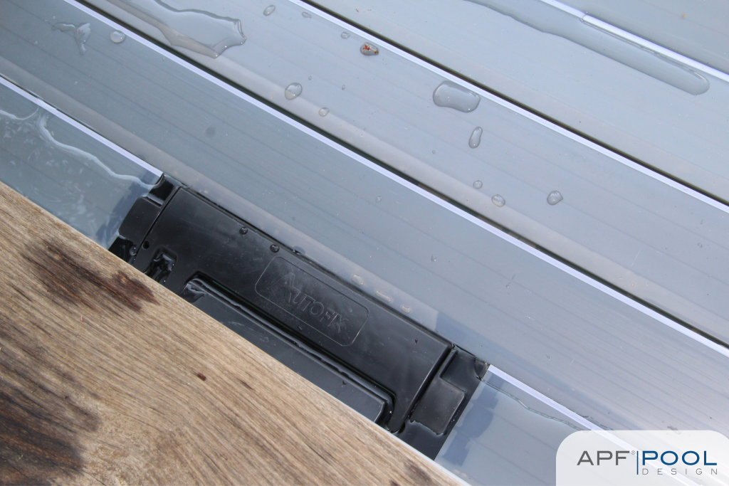 Autofix patented locking system integrated onto the DeckLine X320 pool cover