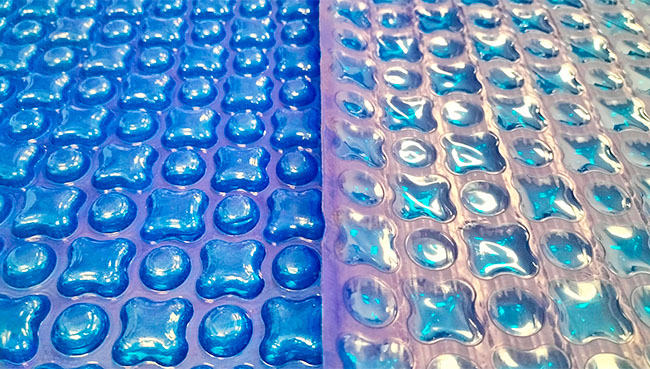 Comparison of two blue shade variations of patented OXO quadri-bubble pool cover film by CID Plastiques.