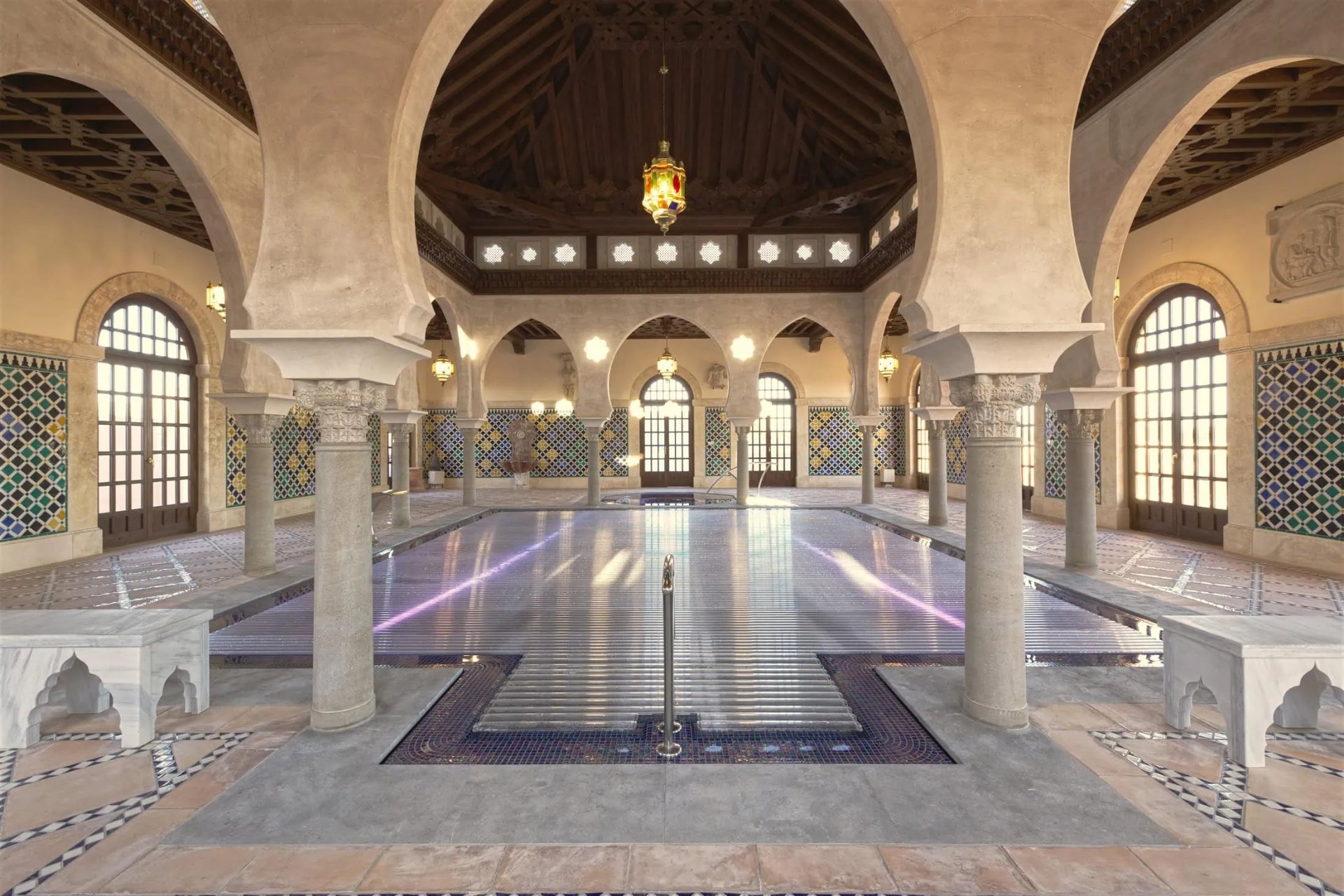 Renovated indoor pool in Spain with transparent ROLLO SOLAR Design Cover
