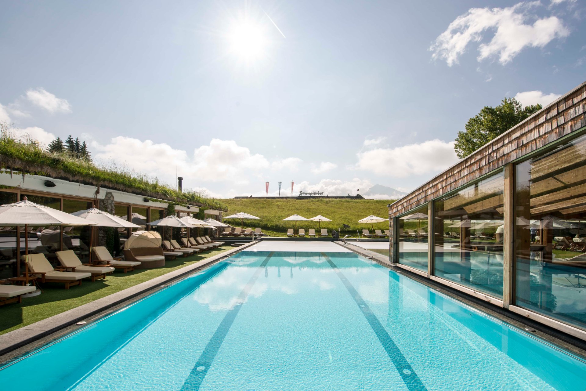 Outdoor pool at Hotel Stanglwirt in Tyrol