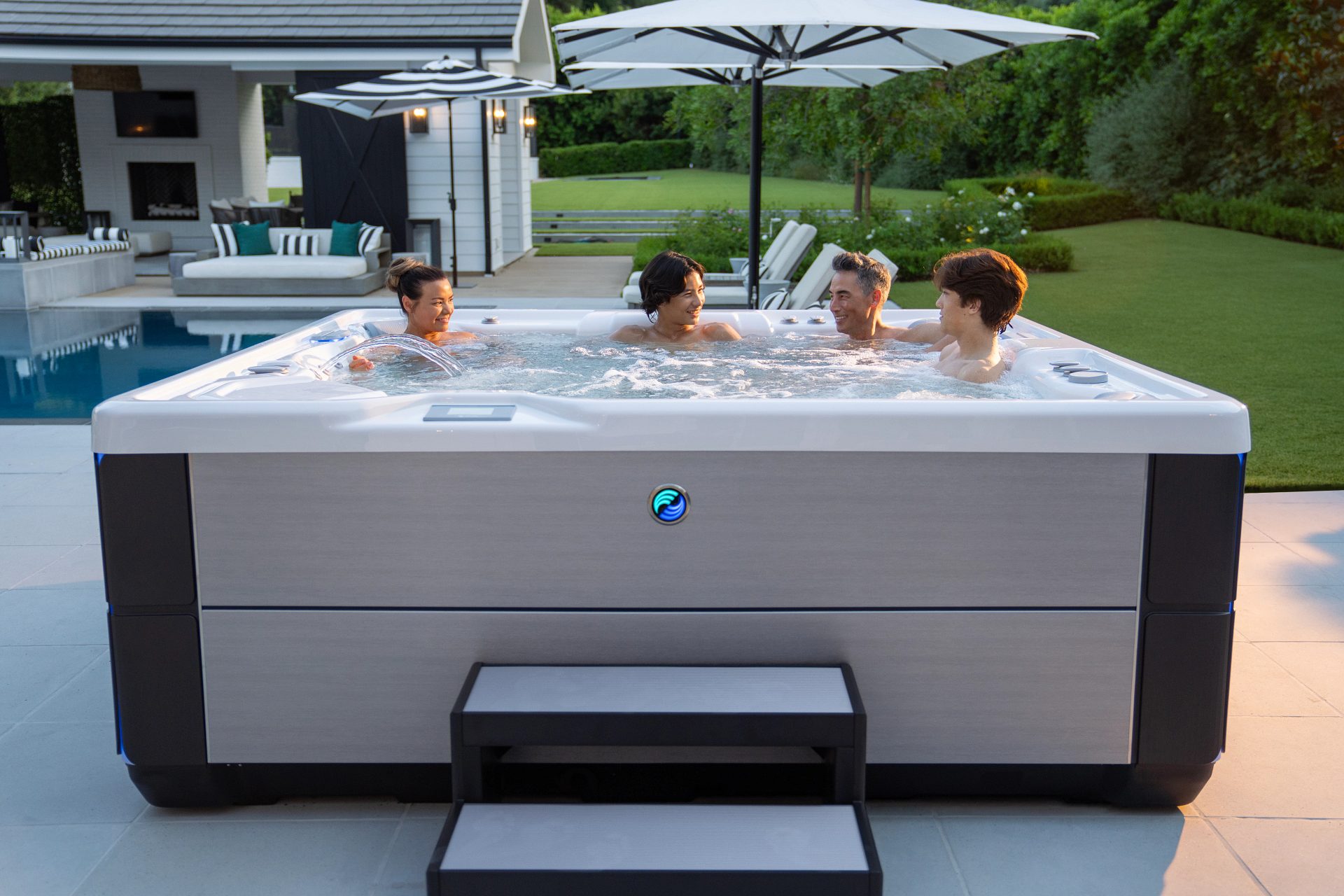 Hot Spring Highlife Grandee hot tub at sunset